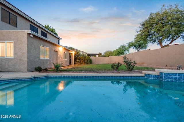 2109 W Wildhorse Dr, Chandler, AZ 85286 - pool at dusk with a fenced backyard