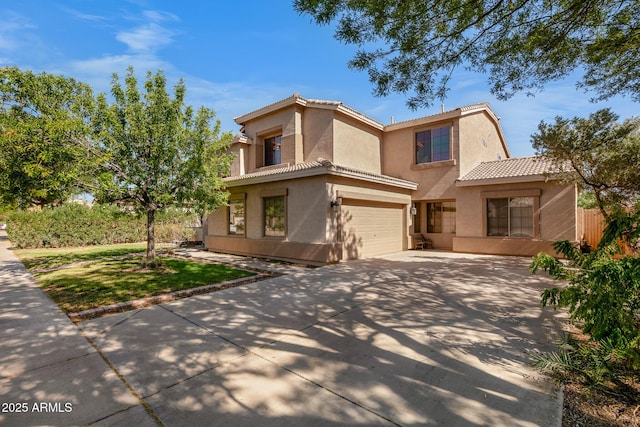 2109 W Wildhorse Dr, Chandler, AZ 85286 - mediterranean / spanish-style home with driveway, a garage, stucco siding, and a tile roof