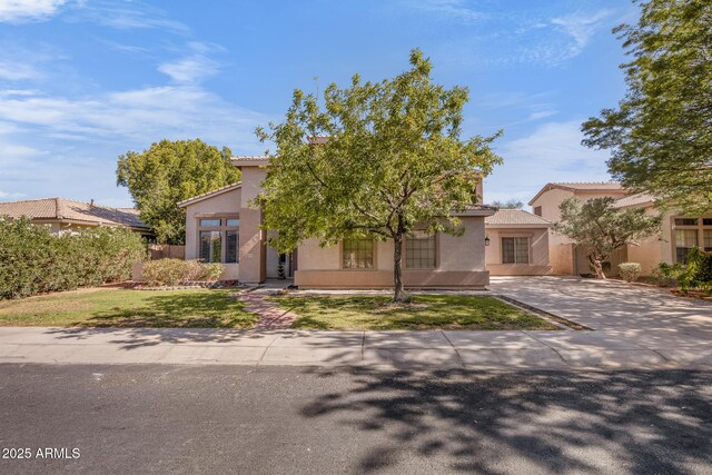2109 W Wildhorse Dr, Chandler, AZ 85286 - view of front of house featuring stucco siding, a tile roof, and driveway