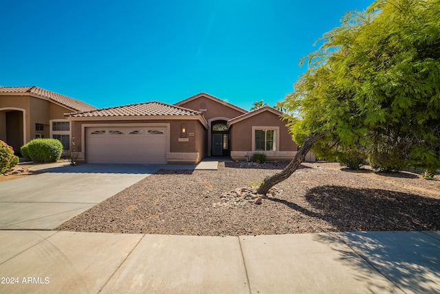 view of front of home featuring a garage