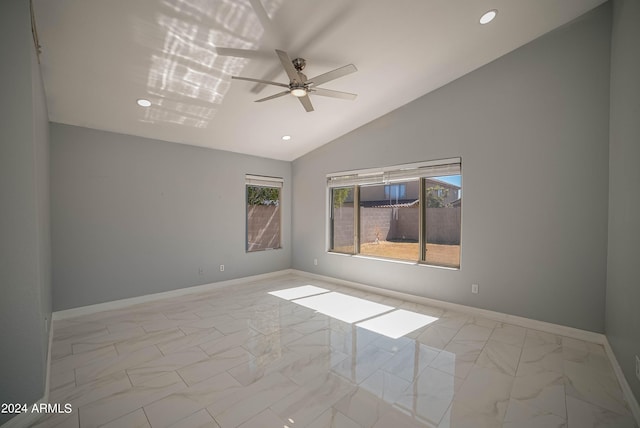 unfurnished room featuring vaulted ceiling and ceiling fan