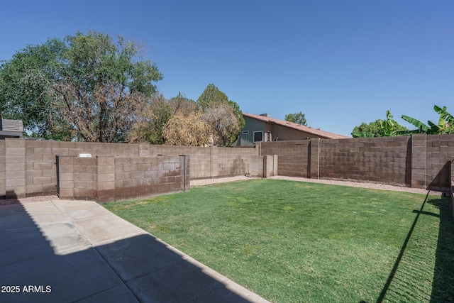 5596 W Mercer Ln, Glendale, AZ 85304 - fenced backyard with a patio area