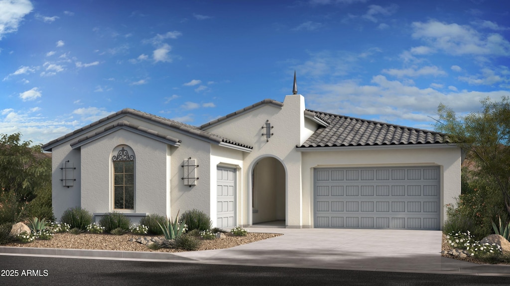 20713 W San Miguel Ave, Buckeye, AZ 85396 - mediterranean / spanish-style house featuring a tiled roof, stucco siding, concrete driveway, and a garage