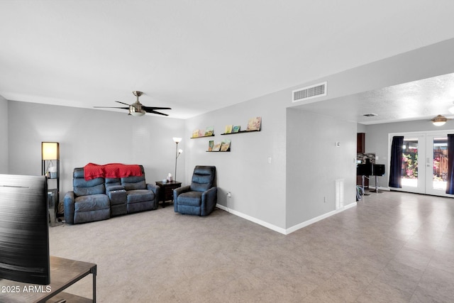 living room with visible vents, french doors, a ceiling fan, and baseboards