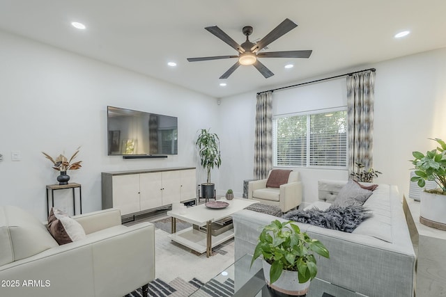 living area with recessed lighting and ceiling fan