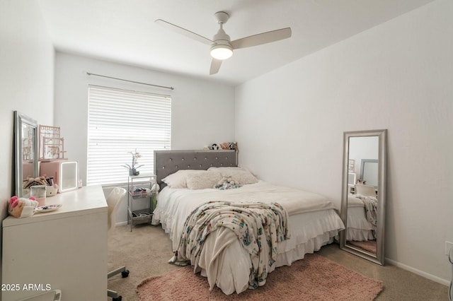 bedroom featuring ceiling fan and light colored carpet