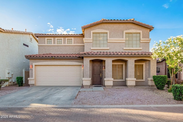 2652 E Riviera Dr, Chandler, AZ 85249 - mediterranean / spanish home featuring driveway, stucco siding, a garage, and a tile roof