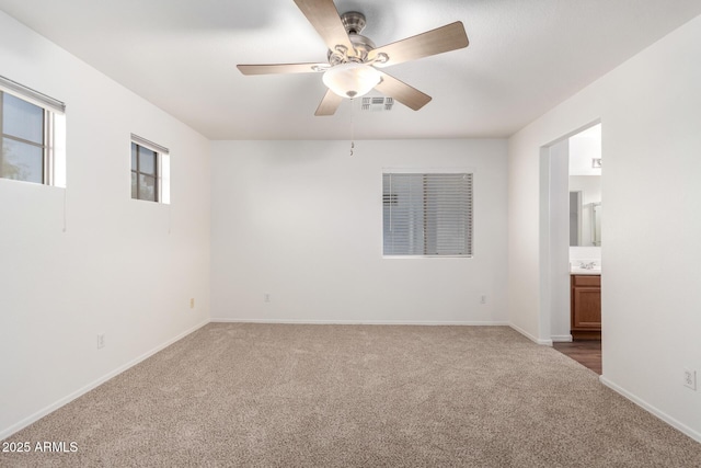 2652 E Riviera Dr, Chandler, AZ 85249 - empty room with carpet flooring, ceiling fan, and baseboards