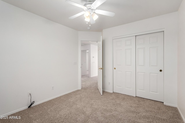 2652 E Riviera Dr, Chandler, AZ 85249 - unfurnished bedroom featuring light carpet, baseboards, and a closet