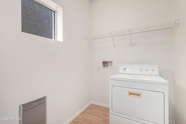 2652 E Riviera Dr, Chandler, AZ 85249 - laundry area featuring washer / dryer, light wood-style floors, and baseboards