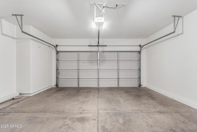 2652 E Riviera Dr, Chandler, AZ 85249 - garage with baseboards and a garage door opener