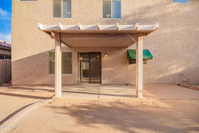2652 E Riviera Dr, Chandler, AZ 85249 - rear view of property with stucco siding and a patio area