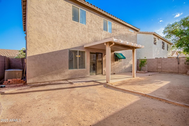 2652 E Riviera Dr, Chandler, AZ 85249 - rear view of property featuring central air condition unit, a patio, a fenced backyard, and stucco siding