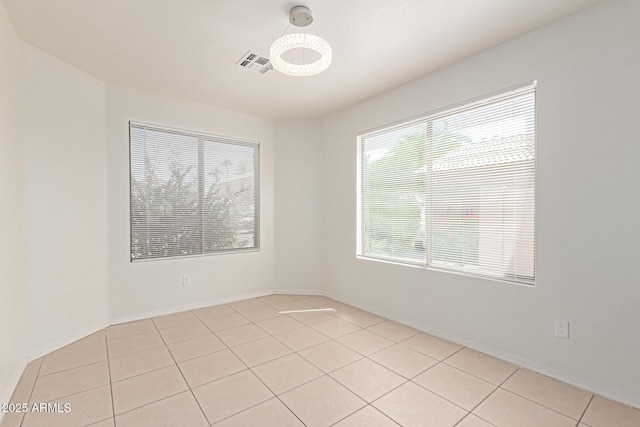 5439 W Sands Rd, Glendale, AZ 85301 - spare room with light tile patterned floors, a smoke detector, and baseboards