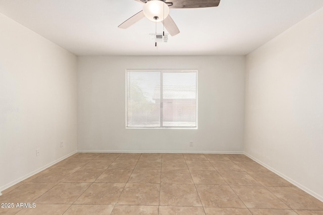 5439 W Sands Rd, Glendale, AZ 85301 - unfurnished room with a ceiling fan, light tile patterned floors, and baseboards