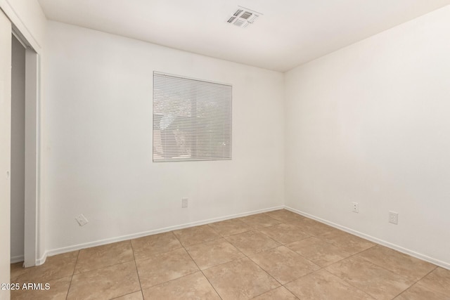 5439 W Sands Rd, Glendale, AZ 85301 - spare room featuring baseboards and light tile patterned floors