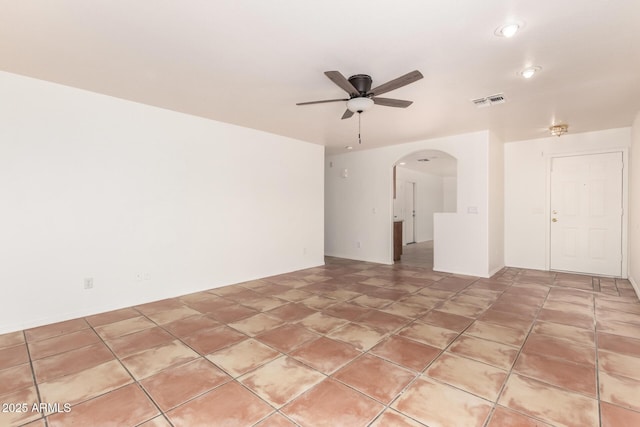 5439 W Sands Rd, Glendale, AZ 85301 - spare room featuring ceiling fan, arched walkways, and recessed lighting