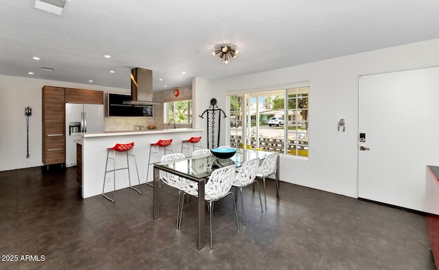 dining room featuring visible vents and recessed lighting