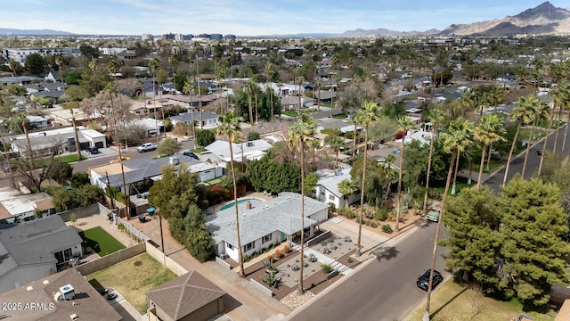 drone / aerial view with a residential view and a mountain view