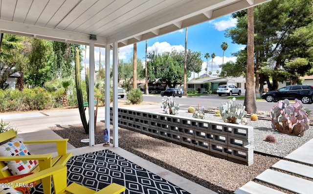 view of patio featuring a porch