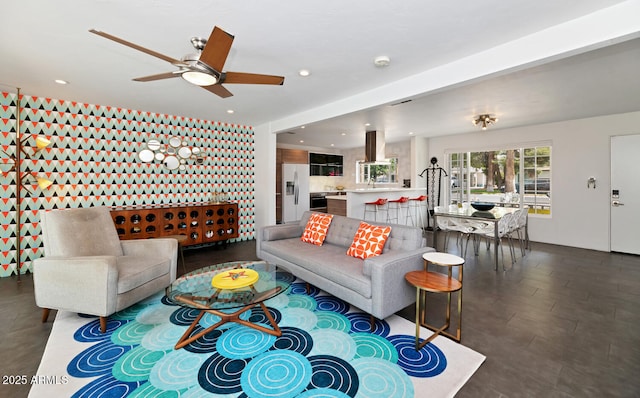 living area with recessed lighting and ceiling fan