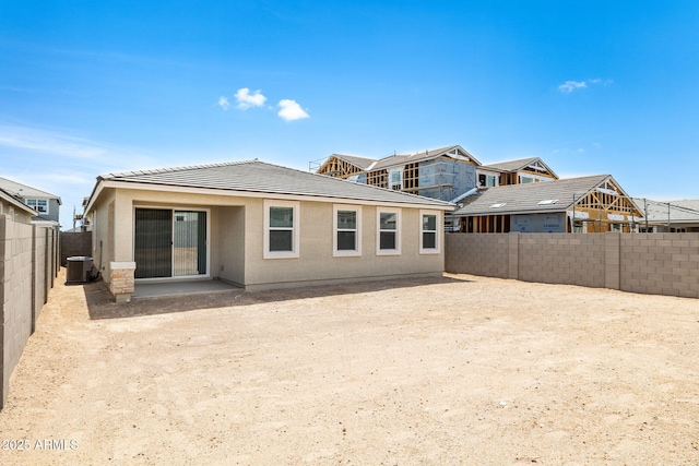 17746 W Turquoise Ave, Waddell, AZ 85355 - back of house with a tile roof, a fenced backyard, and stucco siding