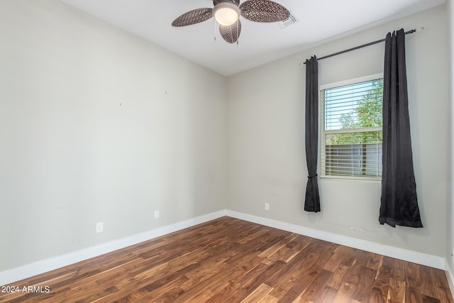 unfurnished room featuring ceiling fan and hardwood / wood-style flooring