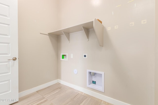 laundry area featuring hookup for an electric dryer, gas dryer hookup, and hookup for a washing machine