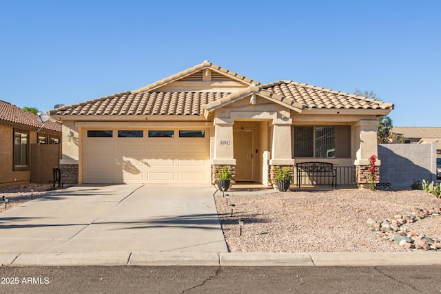4386 E Mine Shaft Rd, San Tan Valley, AZ 85143 - view of front facade featuring fence, stucco siding, a garage, and concrete driveway