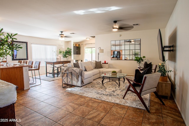 4386 E Mine Shaft Rd, San Tan Valley, AZ 85143 - living room with visible vents, tile patterned flooring, and a ceiling fan
