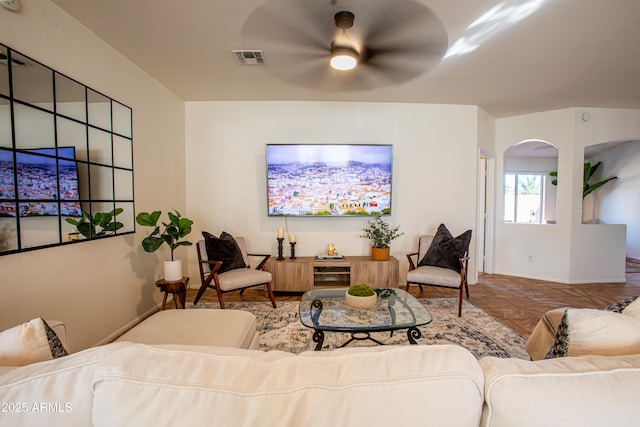 4386 E Mine Shaft Rd, San Tan Valley, AZ 85143 - living area featuring a ceiling fan, arched walkways, and visible vents