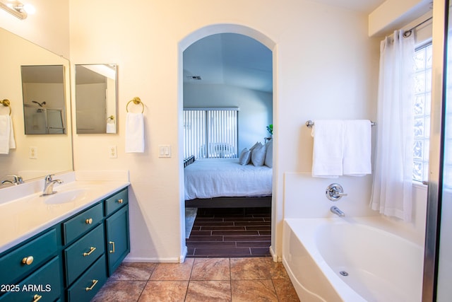 4386 E Mine Shaft Rd, San Tan Valley, AZ 85143 - ensuite bathroom with vanity, baseboards, a garden tub, visible vents, and ensuite bathroom