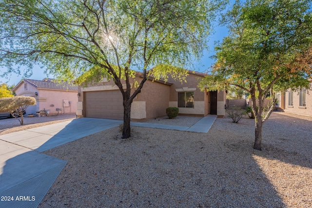 view of front of property featuring a garage