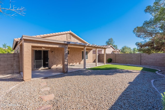 rear view of property with a patio