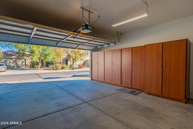 garage featuring a garage door opener