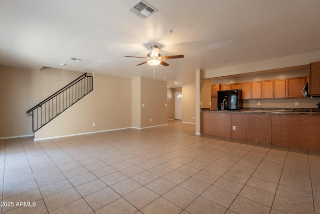 16021 N 30th St Unit 122, Phoenix, AZ 85032 - unfurnished living room with a ceiling fan, stairs, baseboards, light tile patterned floors, and recessed lighting