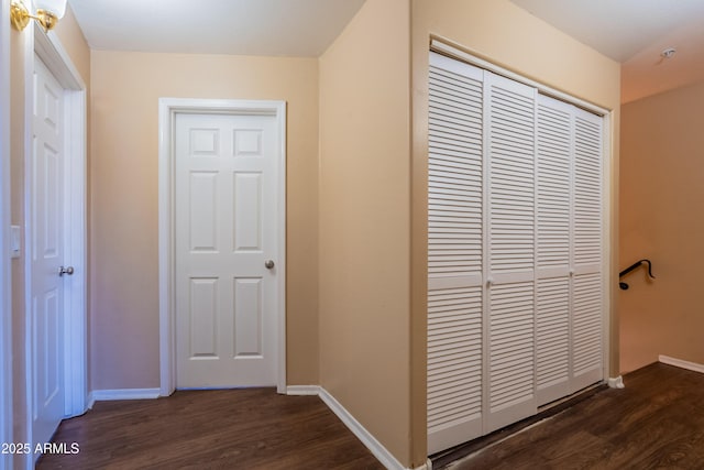 16021 N 30th St Unit 122, Phoenix, AZ 85032 - corridor with dark wood-style flooring and baseboards