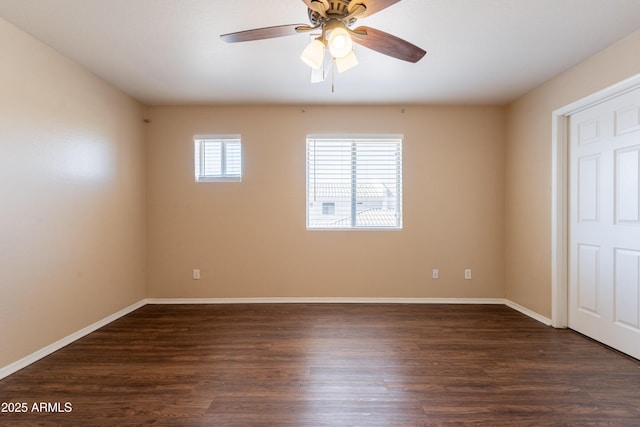 16021 N 30th St Unit 122, Phoenix, AZ 85032 - unfurnished room featuring dark wood-style floors, baseboards, and ceiling fan