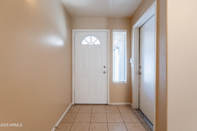 16021 N 30th St Unit 122, Phoenix, AZ 85032 - foyer with light tile patterned floors and baseboards