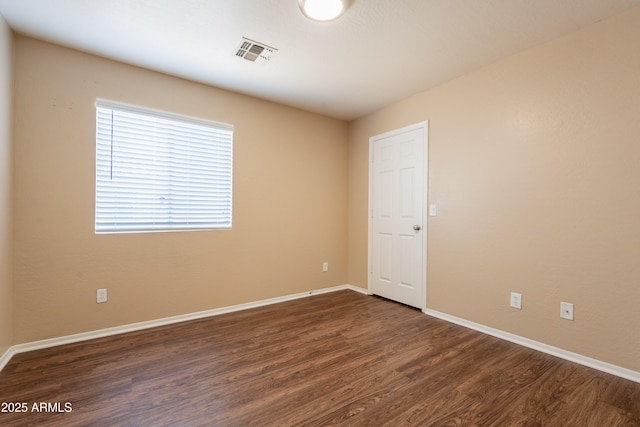 16021 N 30th St Unit 122, Phoenix, AZ 85032 - unfurnished room featuring dark wood finished floors and baseboards
