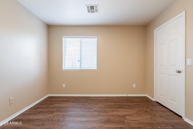 16021 N 30th St Unit 122, Phoenix, AZ 85032 - unfurnished room featuring dark wood-type flooring and baseboards