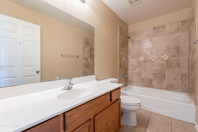 16021 N 30th St Unit 122, Phoenix, AZ 85032 - bathroom featuring toilet, tile patterned floors, vanity, and shower / tub combination