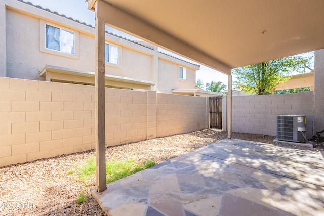 16021 N 30th St Unit 122, Phoenix, AZ 85032 - view of patio / terrace featuring cooling unit and a fenced backyard