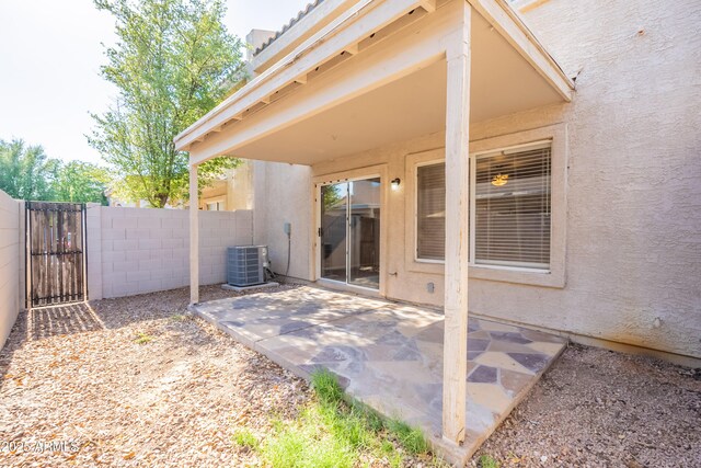16021 N 30th St Unit 122, Phoenix, AZ 85032 - view of patio featuring central air condition unit, fence, and a gate