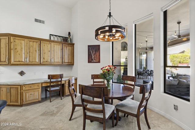 dining space featuring a notable chandelier