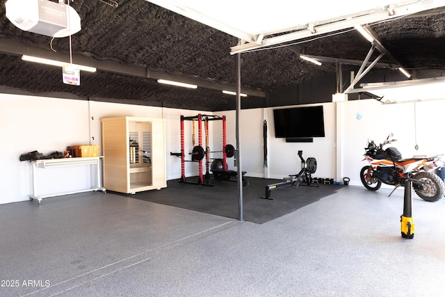 5102 W Whispering Wind Dr, Glendale, AZ 85310 - exercise area featuring a garage
