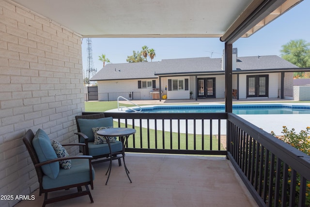 5102 W Whispering Wind Dr, Glendale, AZ 85310 - balcony featuring french doors and view of pool area