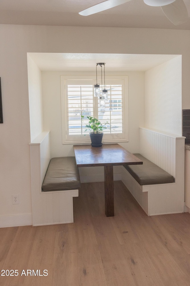 5102 W Whispering Wind Dr, Glendale, AZ 85310 - unfurnished dining area featuring breakfast area and wood finished floors