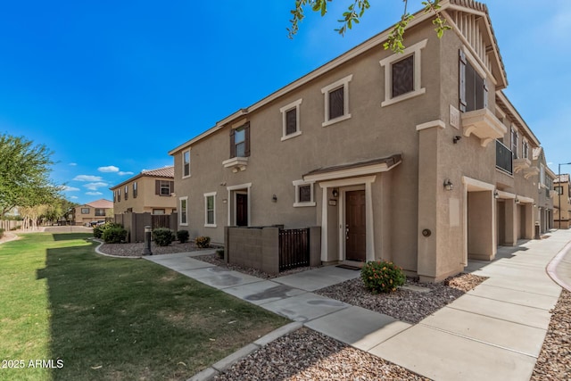 1265 S Aaron Unit 341, Mesa, AZ 85209 - view of front of house with stucco siding and a residential view