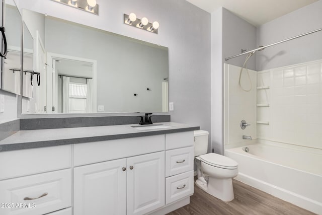 1265 S Aaron Unit 341, Mesa, AZ 85209 - full bath featuring toilet, vanity, wood finished floors, and shower / bathtub combination